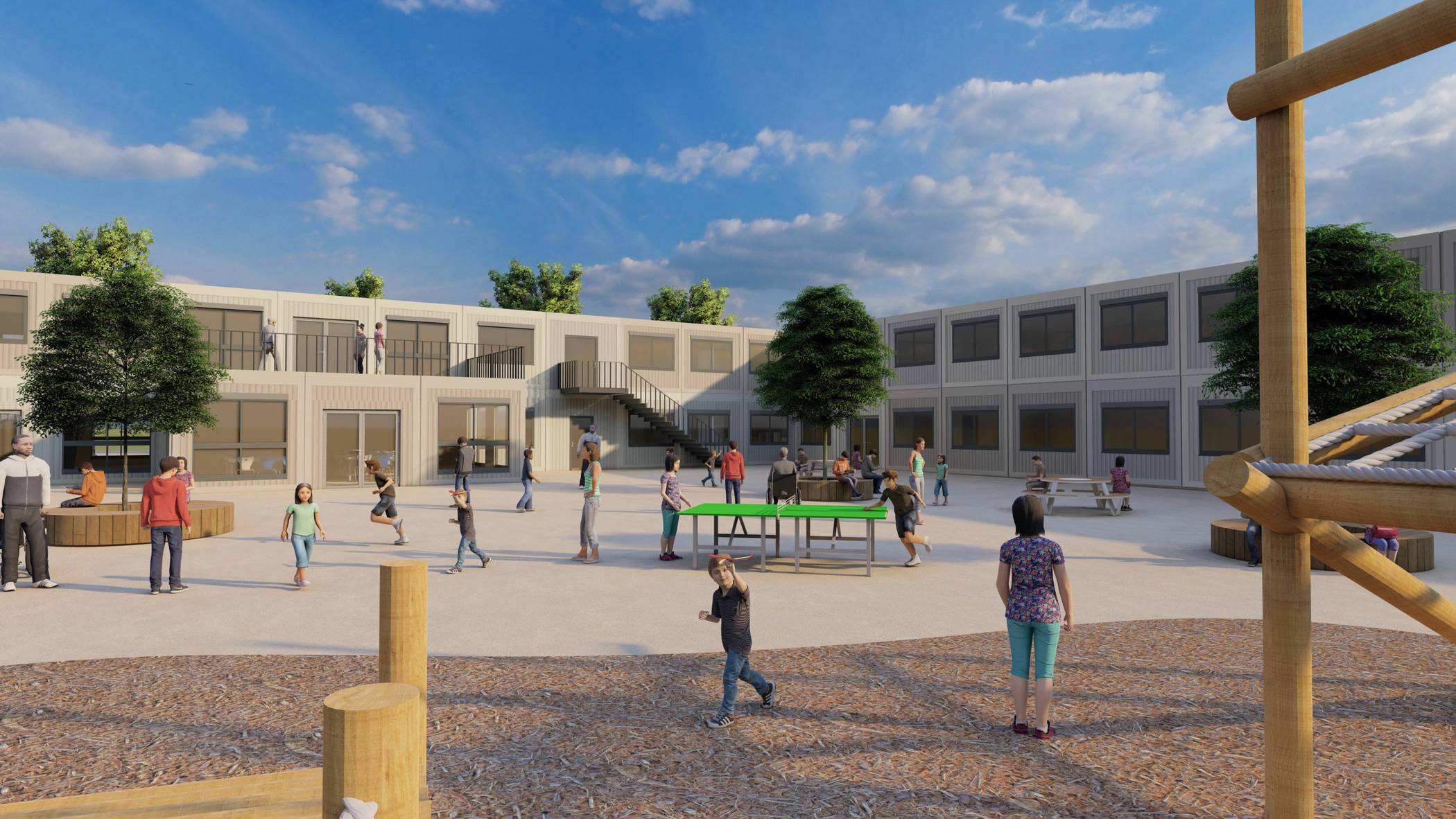 Mit seiner L-Form schafft der zweigeschossige Baukörper einen geschützten Raum für den Pausenhof.