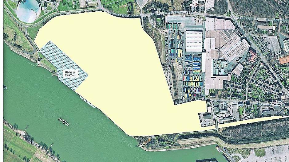  Die schraffierte Fläche im gelb markierten Gebiet des zukünftigen Hafens „Logport VI“ könnte der Standort des Restholz-Kraftwerks werden. Lins oben ist der Kühlturm des bereits bestehenden Kohlekraftwerks zu sehen. 