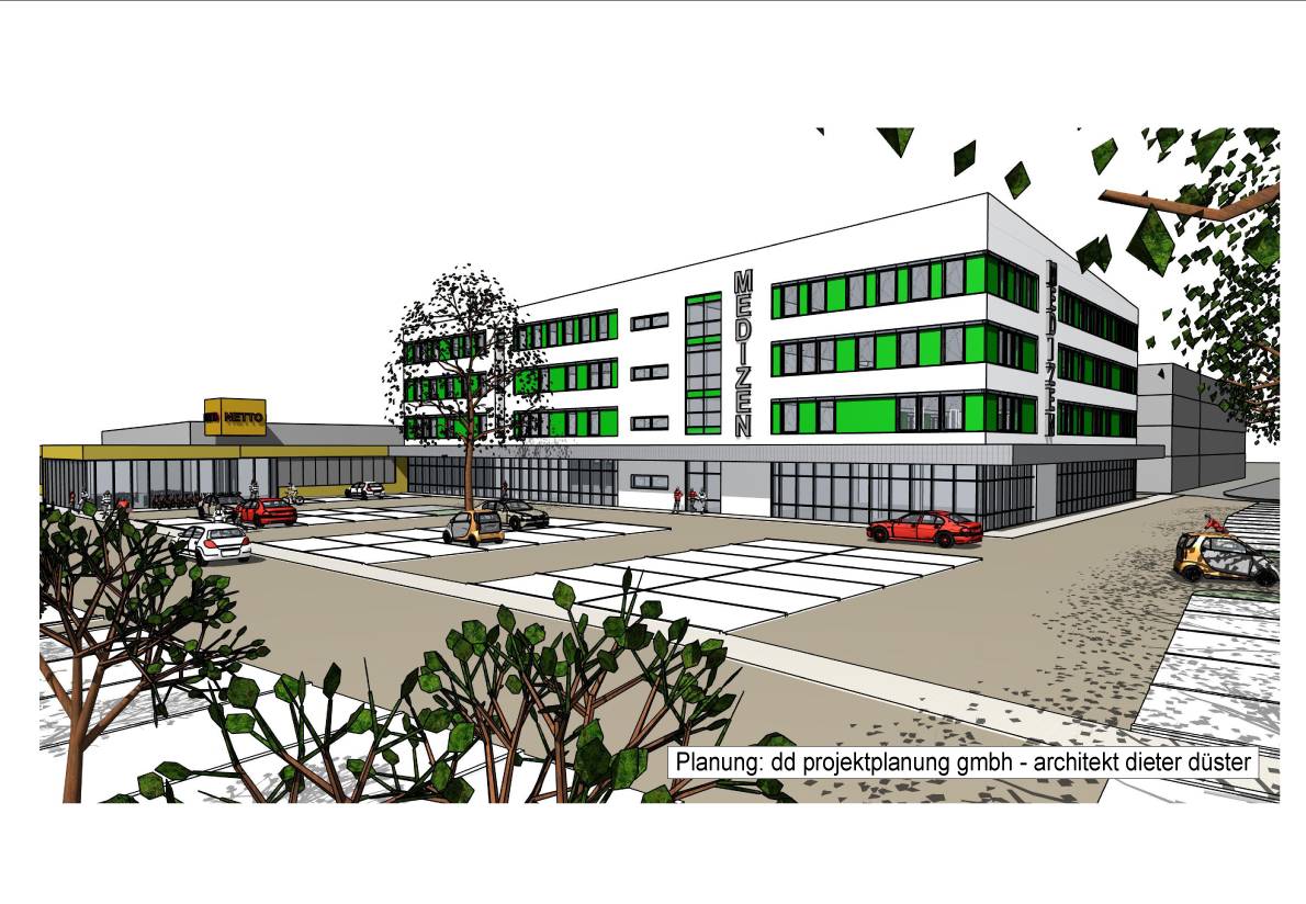 So sieht es im Modell aus, das neue „Gesundheitszentrum Glückaufplatz“ am Standort des ehemaligen Hallenbades Schwarzenberger Straße in Rheinhausen. Der „Netto“-Markt zieht von der Ecke Friedrich-Ebert-Straße zudem an den neuen Standort, samt Café und Außengastronomie.