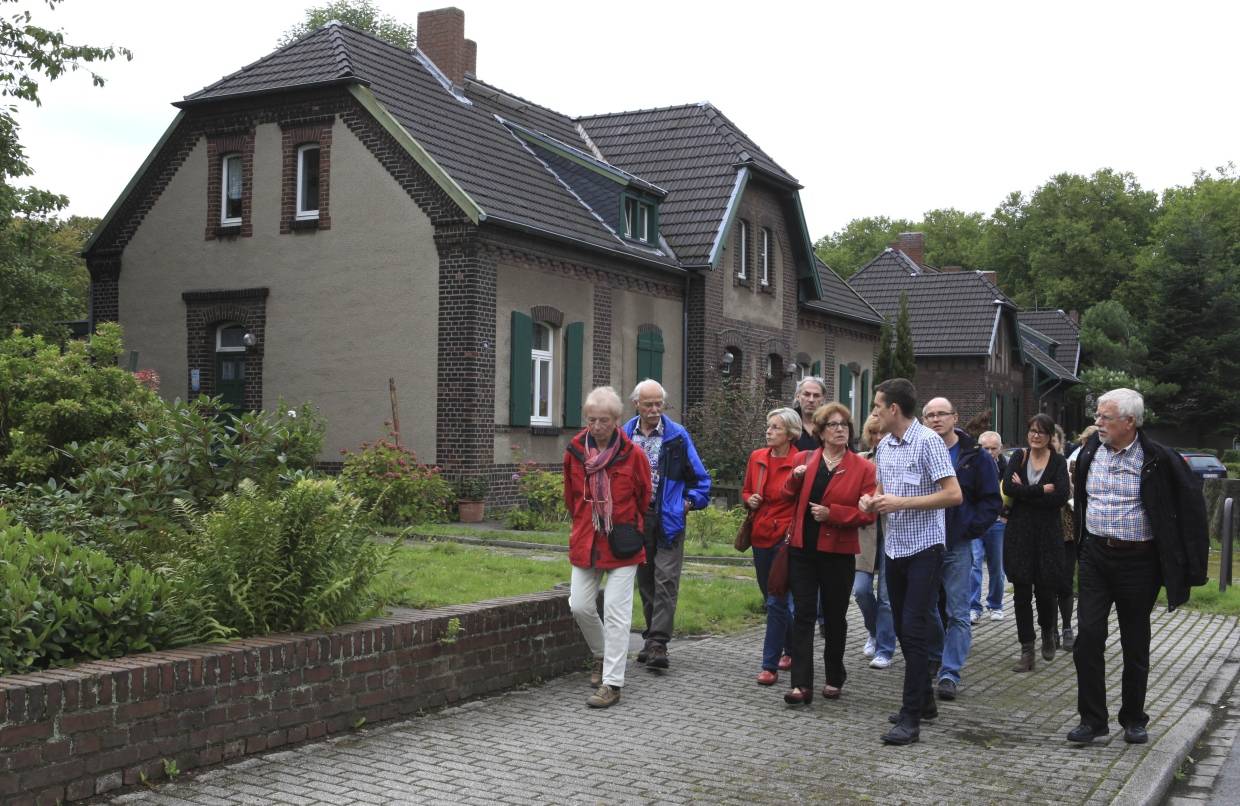 Siedlungshäuser überleben Hochhaus