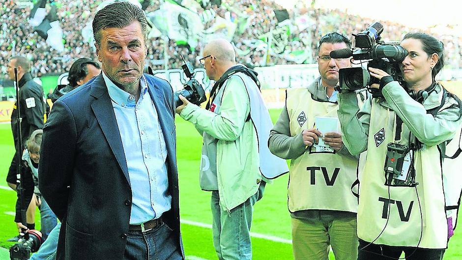  Bitte lächeln: Dieter Hecking hat seinen Vertrag bei Borussia bis Sommer 2020 verlängert. 