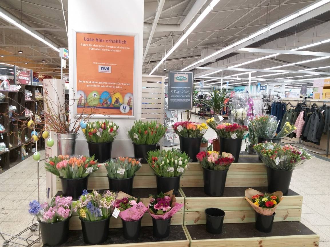 Die Verkaufsstellen werben mit einem Plakat