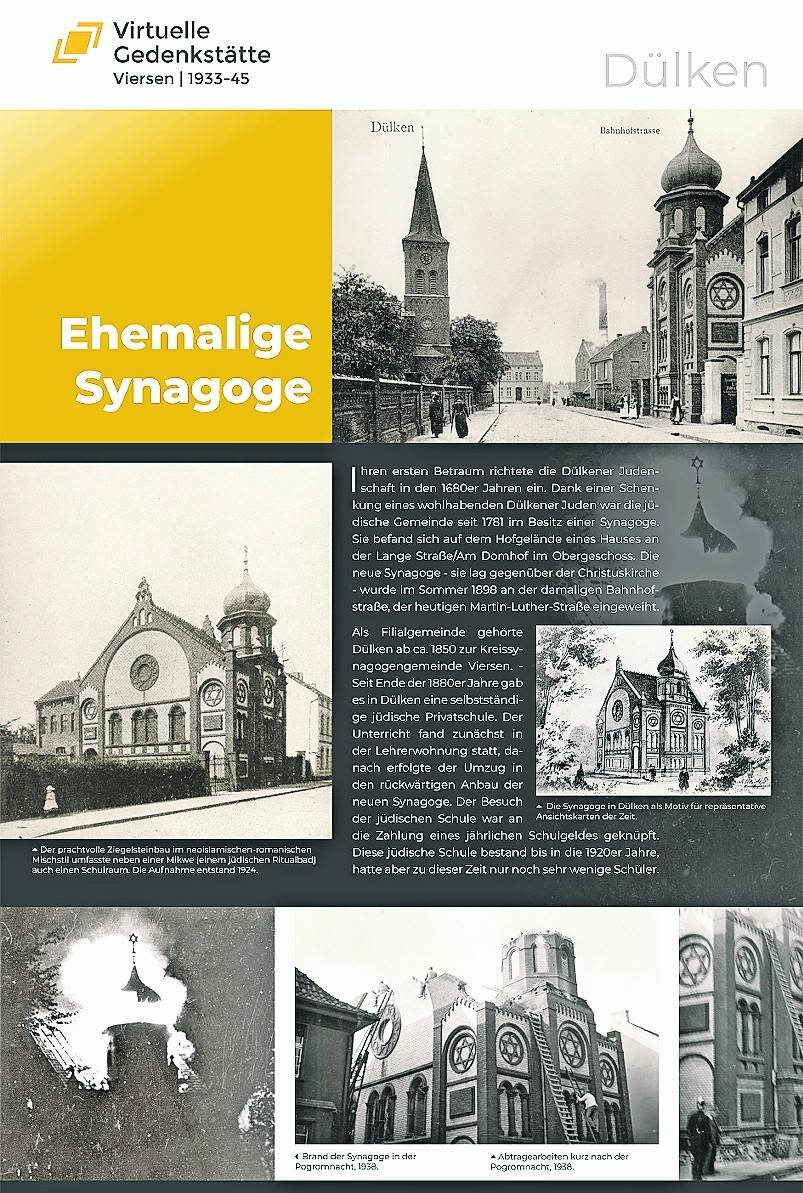 Ein Ausstellungs-Aufsteller zeigt Bilder der ehemaligen Synagoge.
