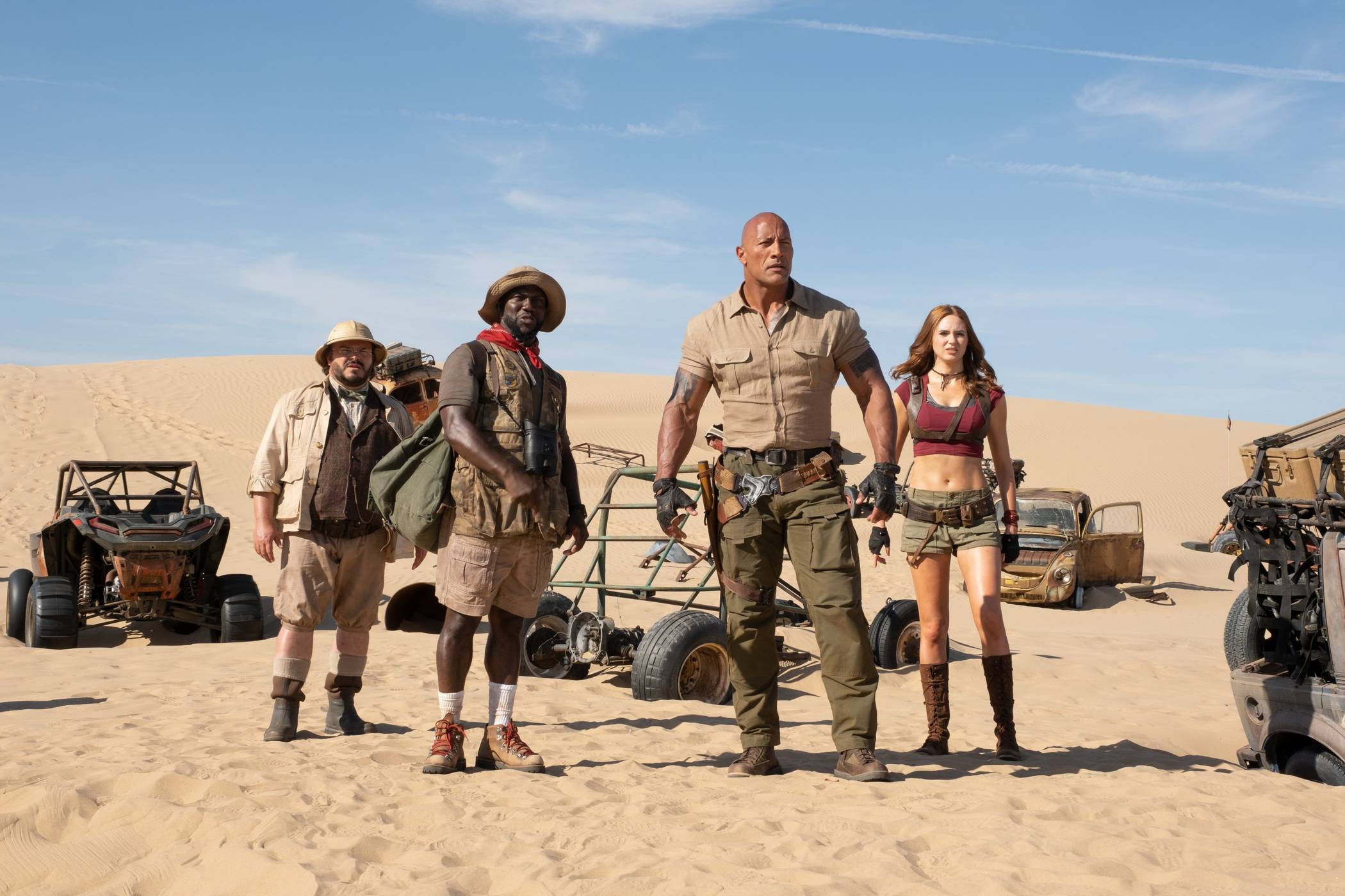  Professor Shelly Oberon (Jack Black), Moose Finbar (Kevin Hart), Dr. Smolder Bravestone (Dwayne Johnson) und Ruby Roundhouse (Karen Gillan) sind die Charaktere im Spiel „Jumanji“.  
