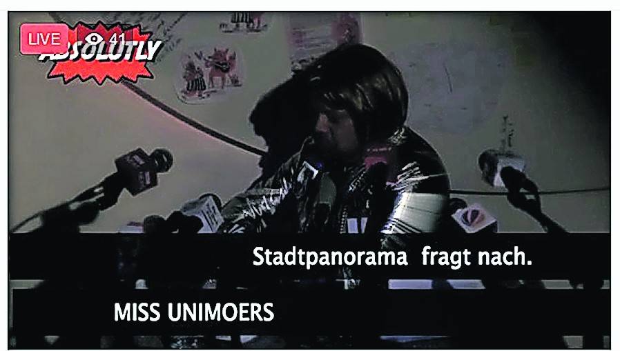  Matthias Heße als Miss Unimoers und das Stadt-Panorama auf dem Laufband – schönen Dank dafür! 